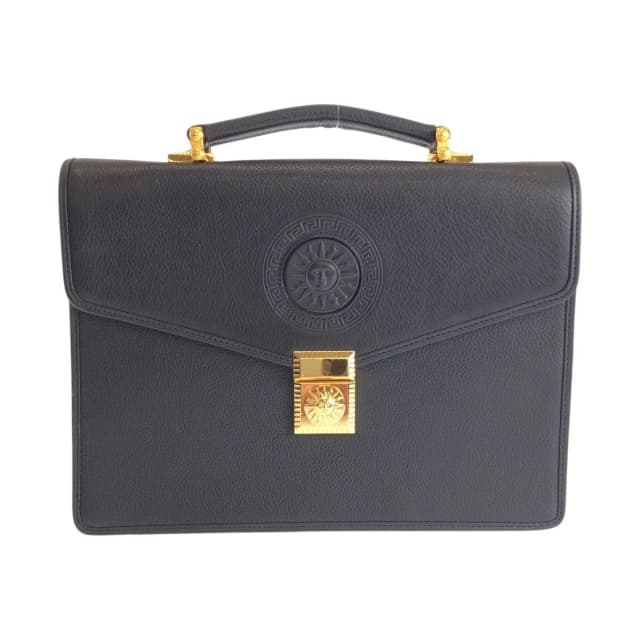 Versace Vintage Sunburst Black Leather Clutch Business in Black Leather from The Reluxe, photo 1 of 1