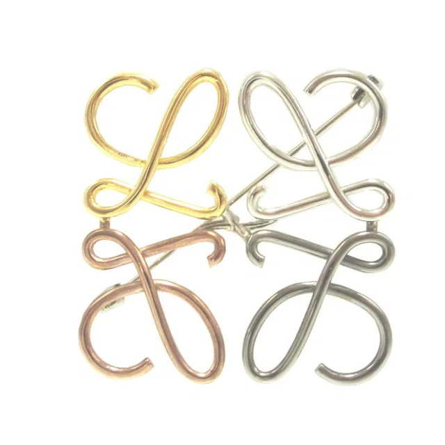 Loewe Anagram Metal Gold Silver Blanc's Gunmetal Brooch in White from The Reluxe, photo 1 of 1
