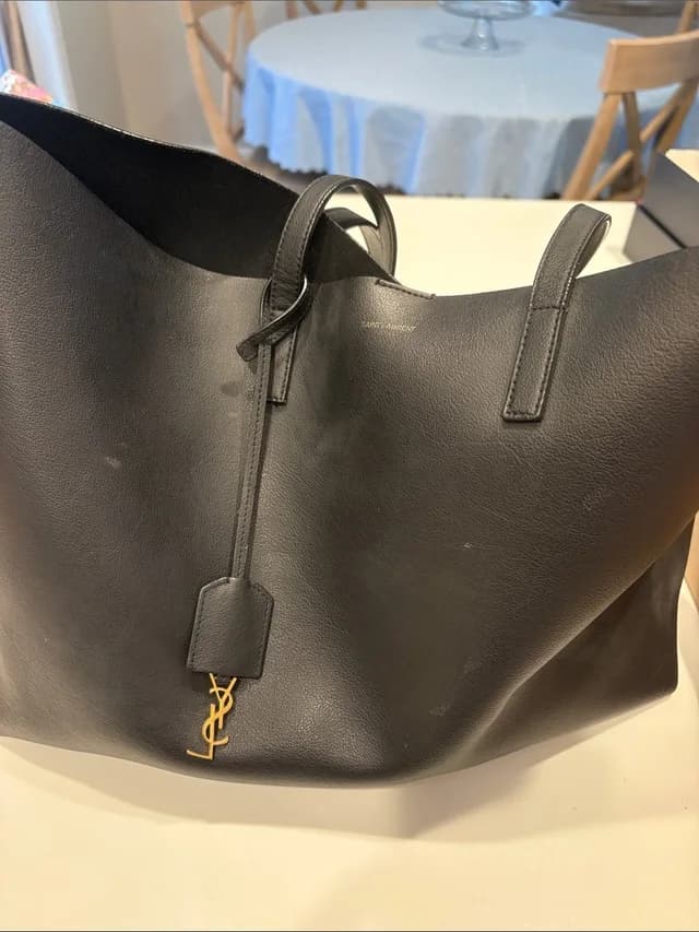 Saint Laurent Black Leather Tote in black|gold Leather from Poshmark, photo 1 of 1