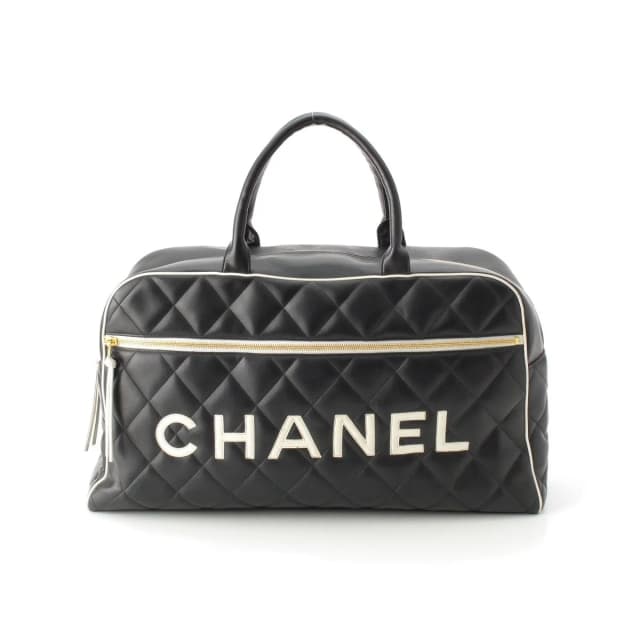 Chanel Quilted Logo Lambskin Boston Bag Black White in Black Lambskin from The Reluxe, photo 1 of 1
