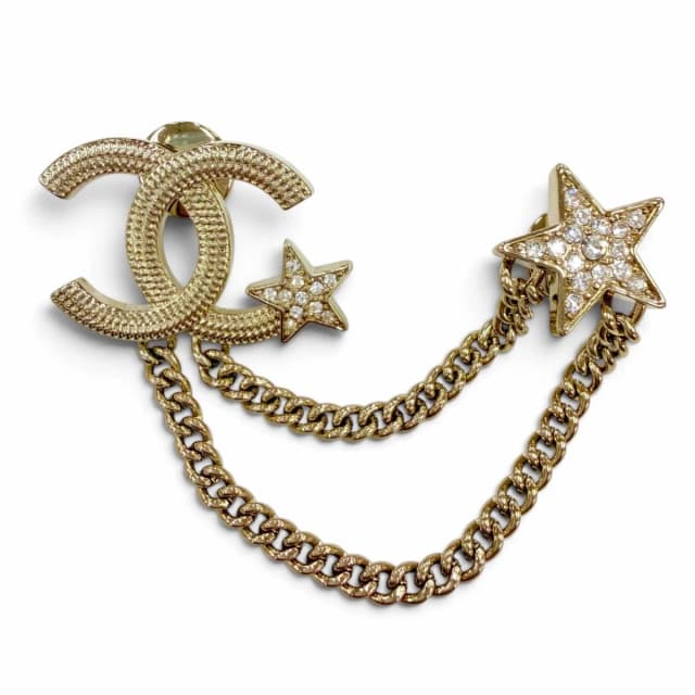 Chanel Metal CC Logo Star Chain Rhinestone Brooch Gold in Gold from The Reluxe, photo 1 of 1