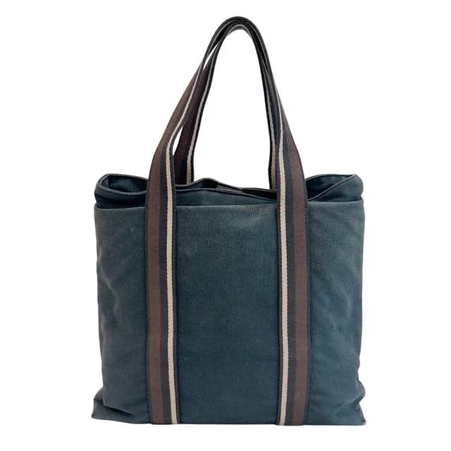 Hermès Troca Horizontal Canvas Tote Bag Black in Black Canvas from The Reluxe, photo 1 of 1
