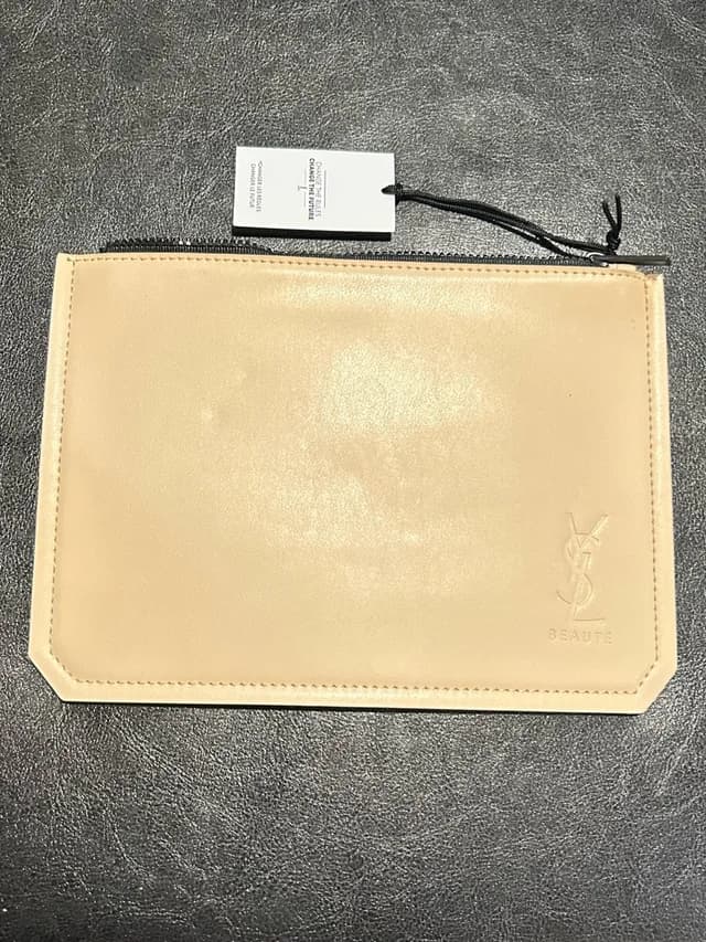 Saint Laurent Pouch Clutch in brown|neutral Leather from Poshmark, photo 1 of 1
