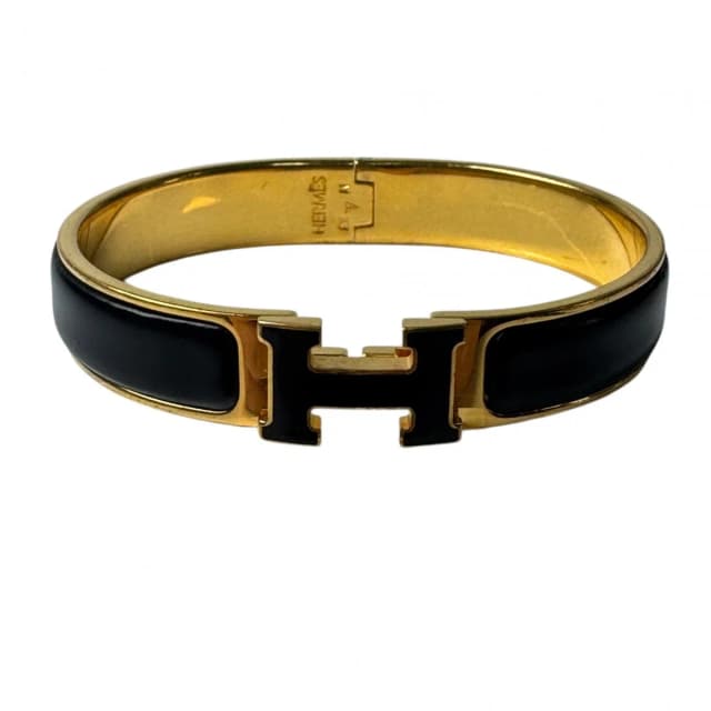 Hermès Clic Clac Bracelet Black Gold in Black from The Reluxe, photo 1 of 1