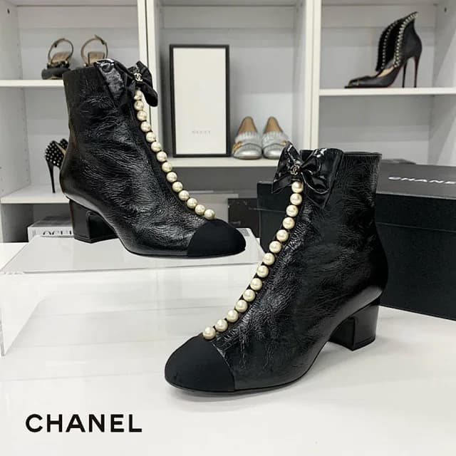 Chanel CC Logo Ribbon Leather Fabric Pearl Short Boots in Leather from The Reluxe, photo 1 of 1
