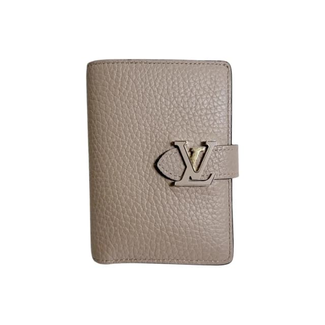 Louis Vuitton Taurillon Leather Bifold Wallet Vertical Compact Beige in Beige Leather from The Reluxe, photo 1 of 1