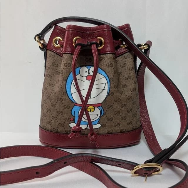 Gucci Doraemon Collaboration Micro GG Supreme Shoulder Bag in Coated canvas from The Reluxe, photo 1 of 1