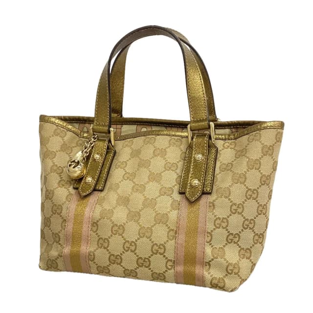 Gucci Handbag GG Canvas Beige Brown Champagne Gold in Brown Canvas from The Reluxe, photo 1 of 1