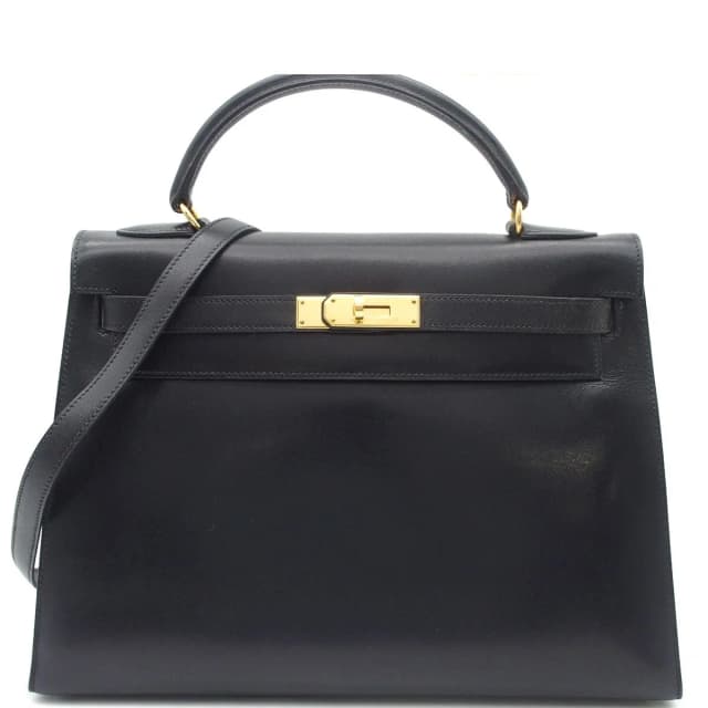 Hermès Kelly 32 Black Gold Box Calf Sellier 2-Way Shoulder Bag in Black Box leather from The Reluxe, photo 1 of 1