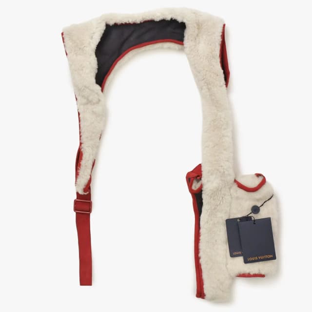Louis Vuitton Rib Utility Vest 3D Multi Pocket Beige in Beige Wool from The Reluxe, photo 1 of 1