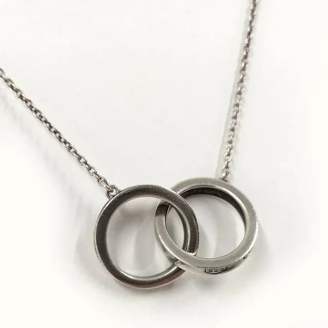 Tiffany & Co. Necklace Interlocking Silver in Silver from The Reluxe, photo 1 of 1