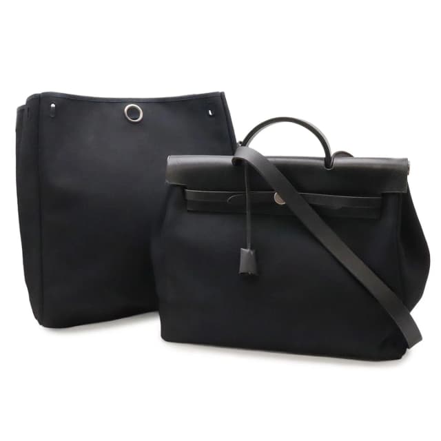 Hermès Herbag MM 2-Way Shoulder Bag Toile Officier Canvas Black Stopper Out in Black Canvas from The Reluxe, photo 1 of 1