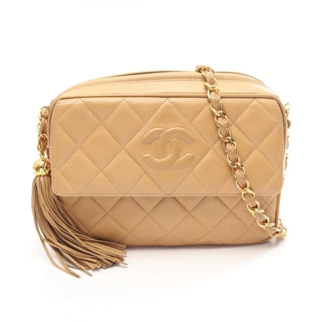 Chanel Shoulder Bag CC Logo Quilted Beige Lambskin Fringe Chain in Beige Lambskin from The Reluxe, photo 1 of 1
