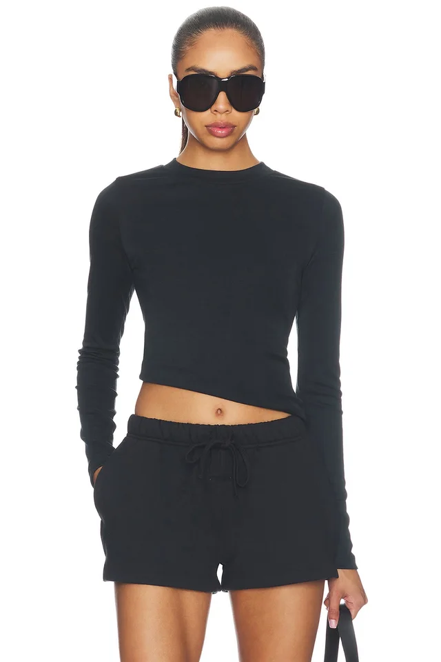 Fear of God ESSENTIALS Fitted Longsleeve Tee in Vintage Black, image 1 of 1 from REVOLVE (Canada)