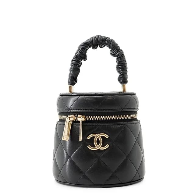 Chanel Handbag Mini Vanity Bag Quilted CC Logo Lambskin Black in Black Lambskin from The Reluxe, photo 1 of 1