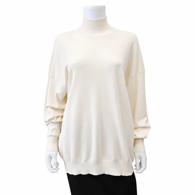 The Row Ivory Silk & Cotton Oversized Turtleneck Sweater in White Silk from Clotheshorse Anonymous, photo 1 of 1
