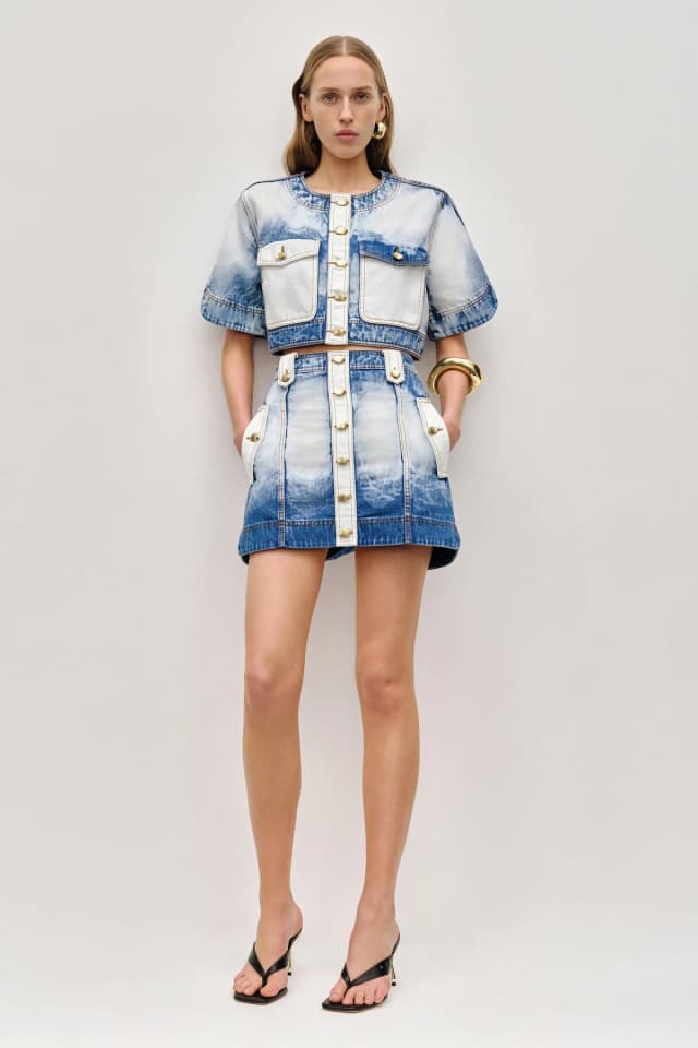 AJE Tides Denim Cropped Top in BLEACH WASH, image 1 of 1 from Aje