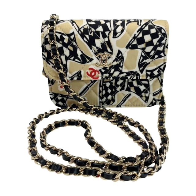 Chanel Accessory Pouch Black Gold Ladies Checkered Flag in Black from The Reluxe, photo 1 of 1
