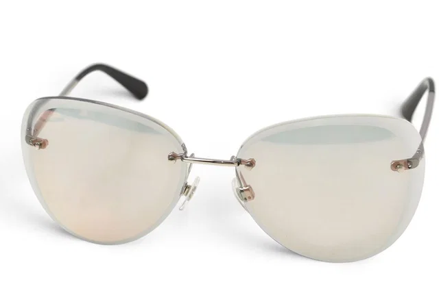 Chanel Sunglasses Eyewear Teardrop Rimless Black in Black from The Reluxe, photo 1 of 1