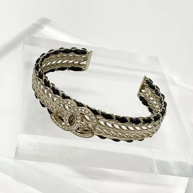 Chanel CC Logo Bangle Rhinestone Leather Bracelet Gold in Gold Leather from The Reluxe, photo 1 of 1