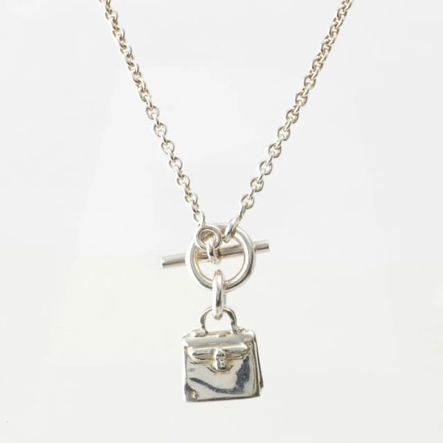 Hermès Amulette Kelly Necklace Silver in Silver from The Reluxe, photo 1 of 1