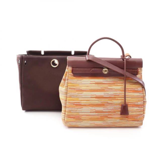 Hermès Handbag Herbag PM 2-Way Brown Multi Leather in Brown Leather from The Reluxe, photo 1 of 1