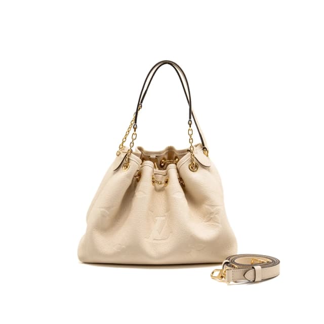 Louis Vuitton Bundle Monogram Empreinte leather cream GHW in White Leather from EMIER, photo 1 of 1