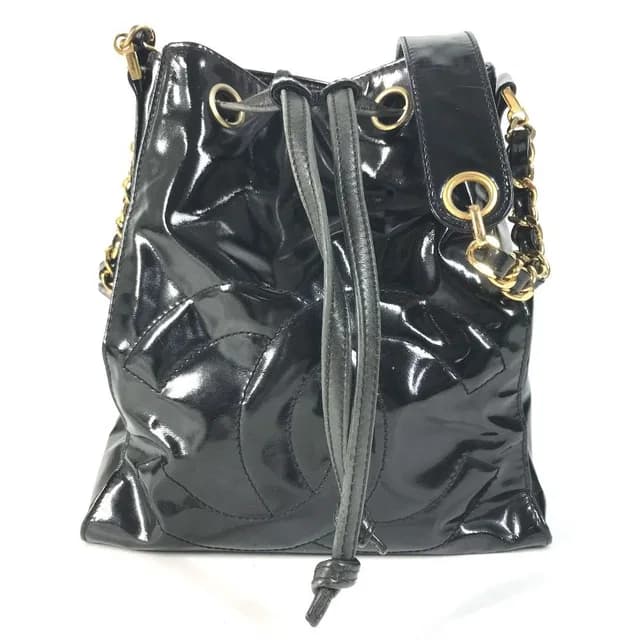 Chanel Shoulder Bag Drawstring CC Logo Enamel Black in Black from The Reluxe, photo 1 of 1