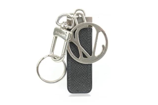Louis Vuitton Black Taiga Leather Silver Logo Keychain Bag Charm Pendant in Black Leather from Bagriculture, photo 1 of 1