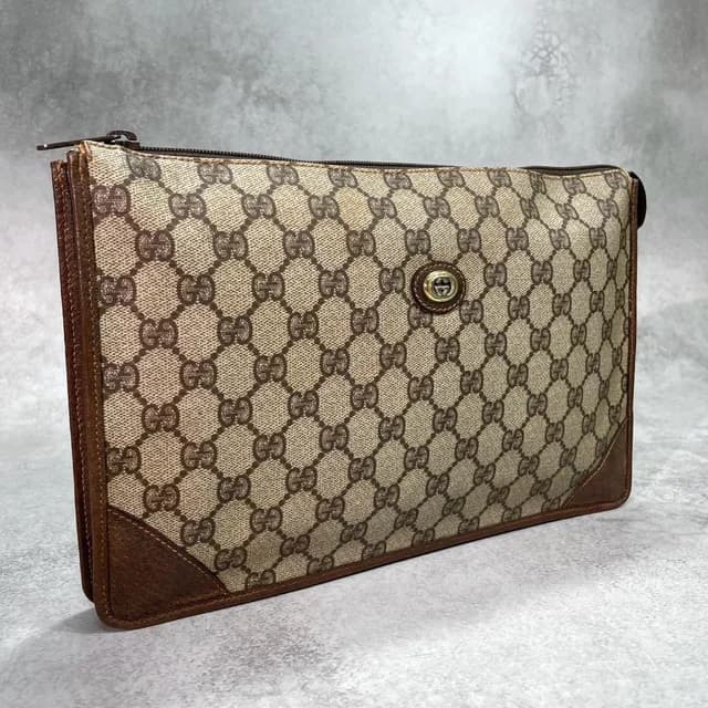 Gucci GG Clutch Brown Leather Logo Gold in Brown Leather from The Reluxe, photo 1 of 1