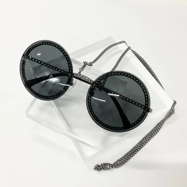Chanel Sunglasses CC Logo Chain Eyewear Black in Black from The Reluxe, photo 1 of 1