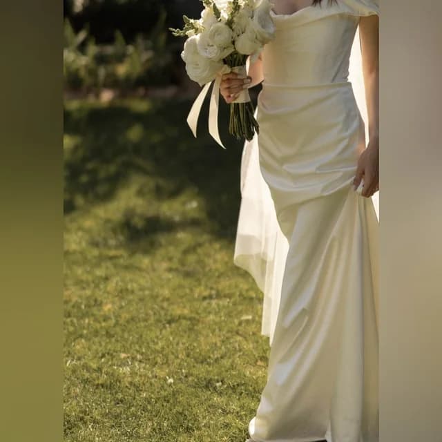 Vivienne Westwood Ivory Cream Satin Wedding Dress in white Satin from Poshmark, photo 1 of 1