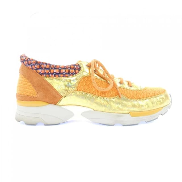 Chanel Sneakers Orange in Orange Calfskin from The Reluxe, photo 1 of 1