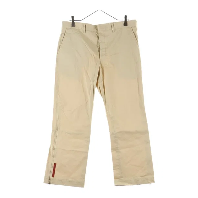 Prada Sport Rubber Logo Hem Zip Button Fly Flare Chino Pants Beige in Beige from The Reluxe, photo 1 of 1