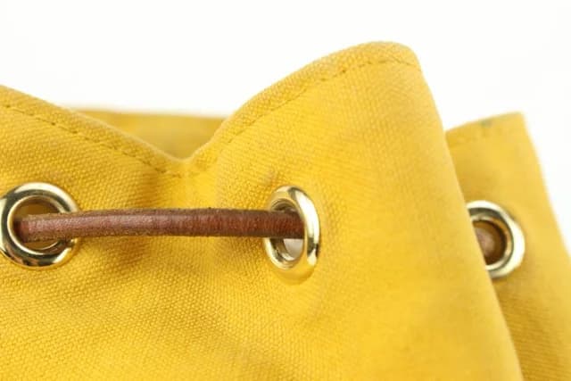 Hermès Yellow Canvas Sac Polochon Mimile Drawstring Backpack in Yellow Canvas from Bagriculture, photo 1 of 1