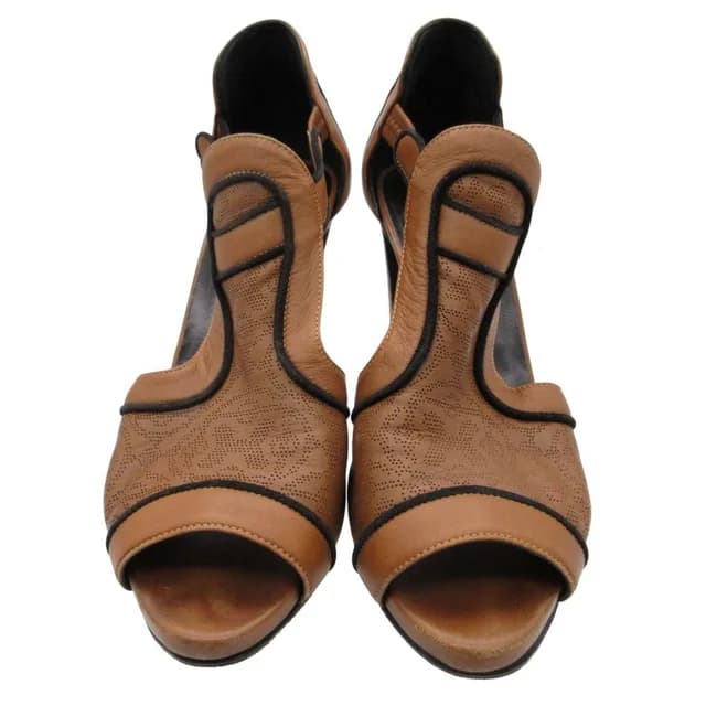 Hermès Sandals Punched Leather Open Toe Heels Booties Brown Boots in Brown Leather from The Reluxe, photo 1 of 1