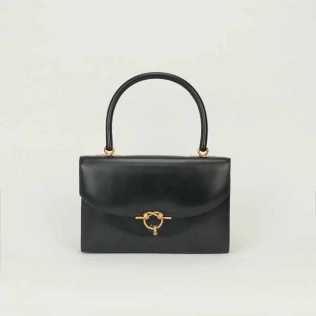 Hermès Tote Box Calf Noir Black Gold Handbag in Black Box leather from The Reluxe, photo 1 of 1