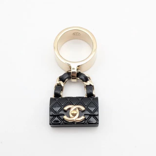 Chanel Ring CC Logo Turnlock Quilted Leather Bag Motif Black Gold 23c in Black Leather from The Reluxe, photo 1 of 1