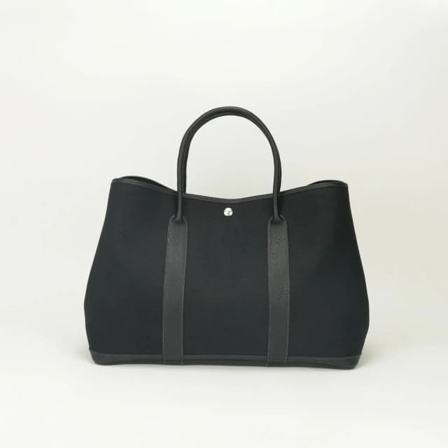 Hermès Garden Party GM 50 Tote Toile Officier Noir Black Silver Handbag in Black Canvas from The Reluxe, photo 1 of 1