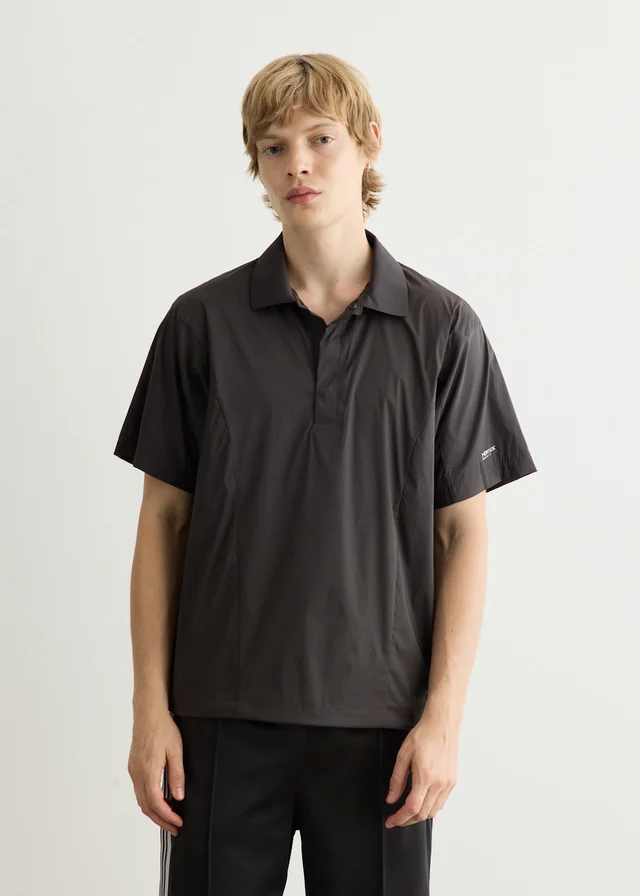 New Balance NB Grey Polo in FADED BLACK (ABR), image 1 of 1 from Incu