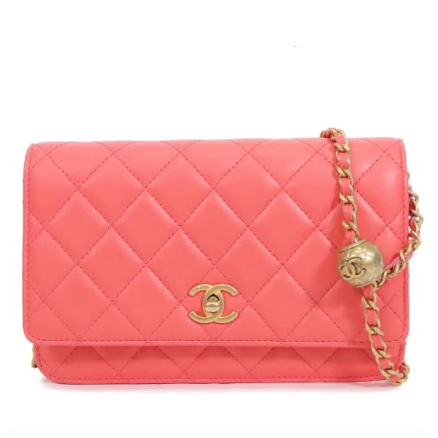 Chanel Chain Wallet Pink Gold Lambskin Quilted Pochette Coco Ball Shoulder Bag in Pink Lambskin from The Reluxe, photo 1 of 1