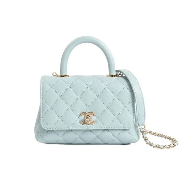 Chanel Handbag Top Handle Mini Flap Bag in Caviar leather from The Reluxe, photo 1 of 1