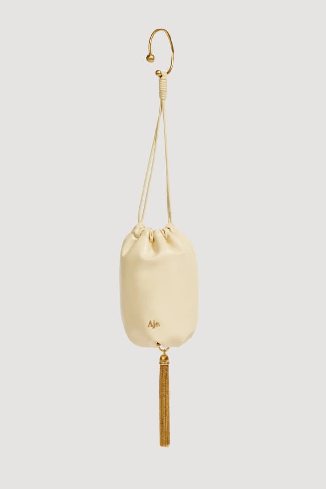 AJE Ceremonia Drawstring Pouch in BUTTER, image 1 of 1 from Aje