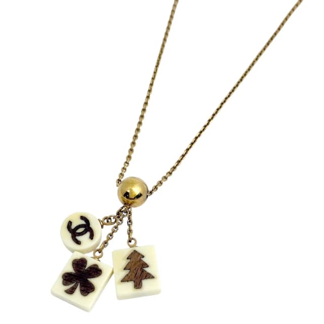Chanel CC Logo Necklace Clover Tree Gold Plated White in White from The Reluxe, photo 1 of 1