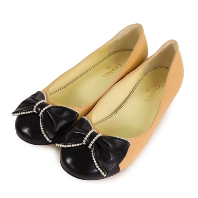 Chanel Ribbon Pumps Beige Black Leather Costume Pearl Round to Ro Heels in Black Leather from The Reluxe, photo 1 of 1