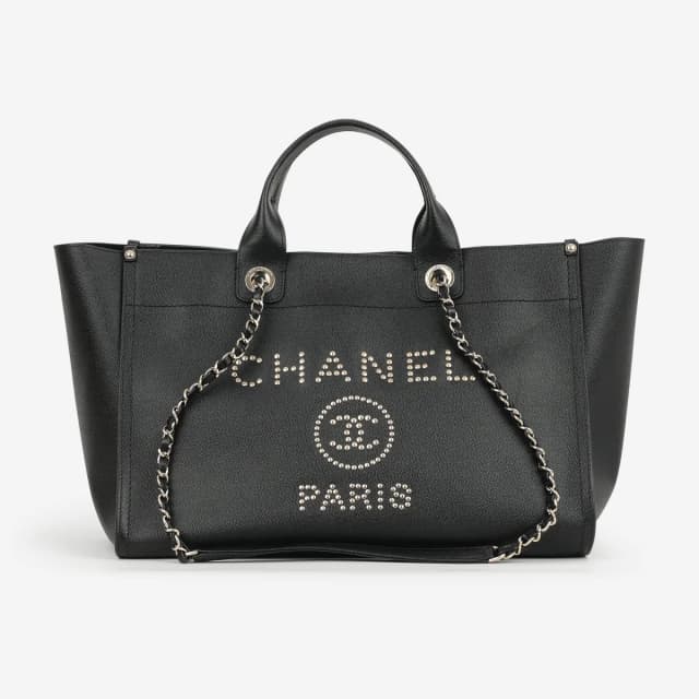 Chanel Large Deauville - Black Studded Caviar | Champagne Gold Hardware in Black Calfskin Leather from Bagista, photo 1 of 1