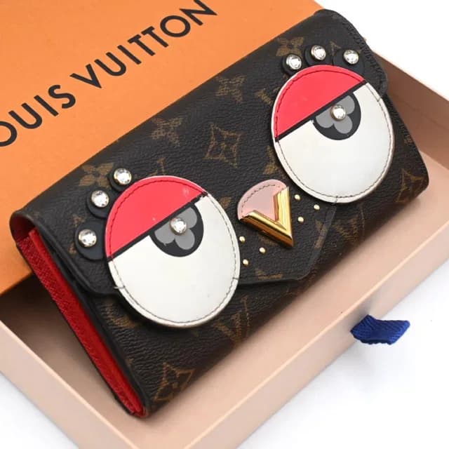 Louis Vuitton Monogram Lovely Bird Portefeuille Sarah Wallet in Coated canvas from The Reluxe, photo 1 of 1