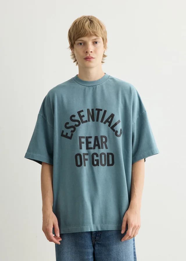 Fear of God Essentials Campus 90's Short Sleeve T-Shirt in FADED COASTAL, image 1 of 1 from Incu