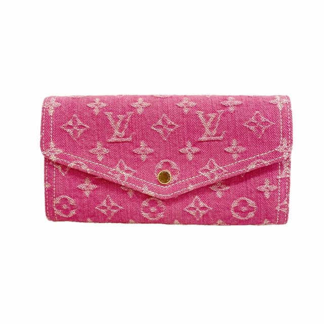 Louis Vuitton Wallet Monogram Denim Portefeuille Sarah Fuchsia in Pink Denim from The Reluxe, photo 1 of 1