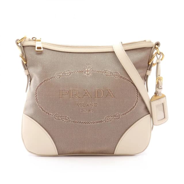 Prada Shoulder Bag Logo Jacquard Beige Ivory Canvas Leather in White Canvas from The Reluxe, photo 1 of 1